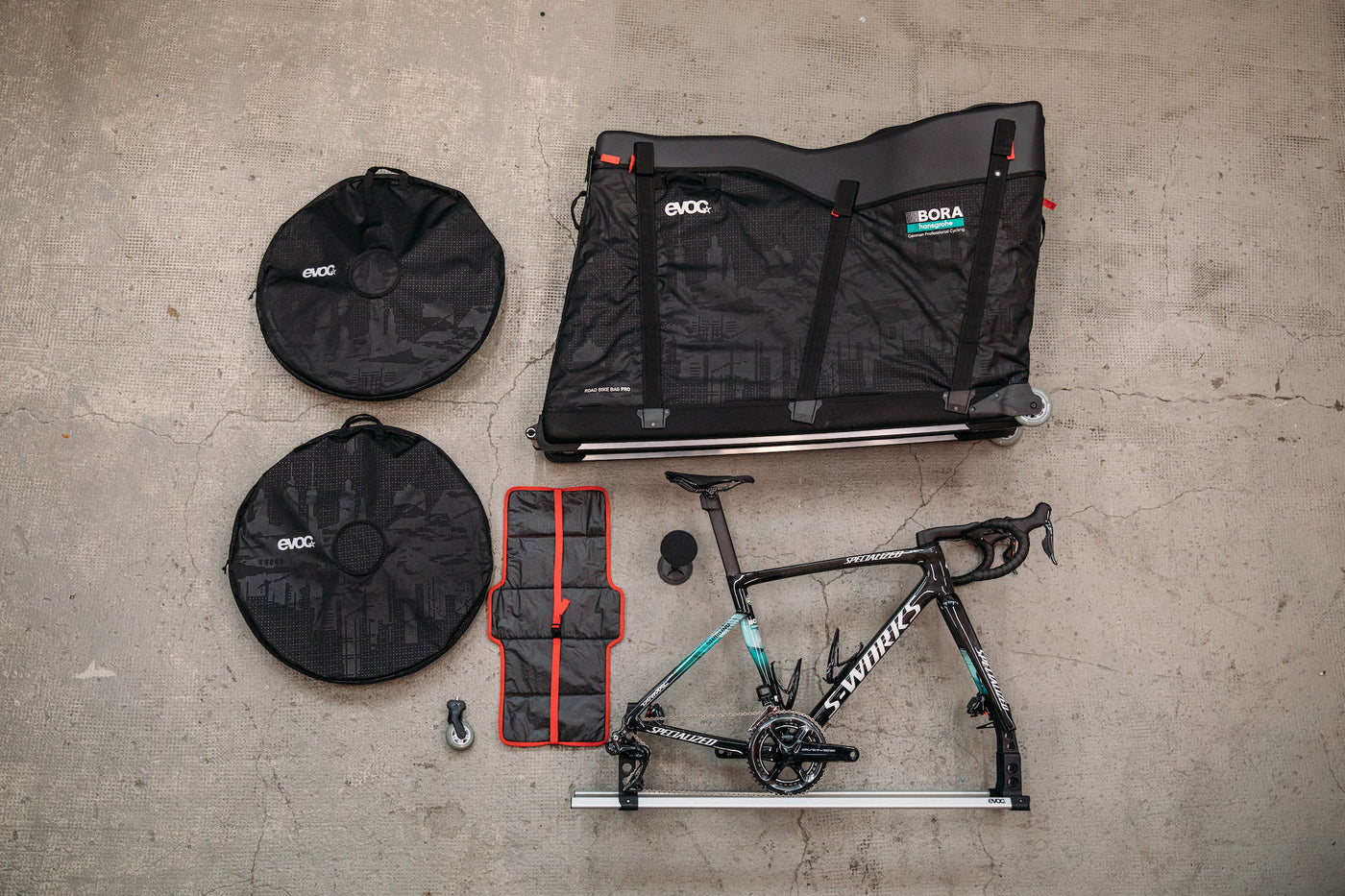 EVOC Road Bike Bag Pro cycling travel case with BORA hansgrohe team logos