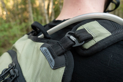 EVOC Stage 6L backpack with Bracelink straps that adjust to wearer's shoulder width as shown on Freehub Magazine reviewer