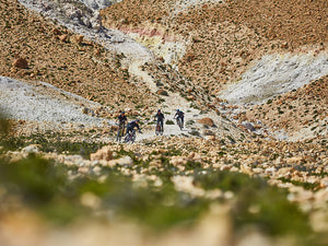 Mountain bikers wearing EVOC gear